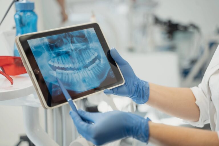 person holding black ipad